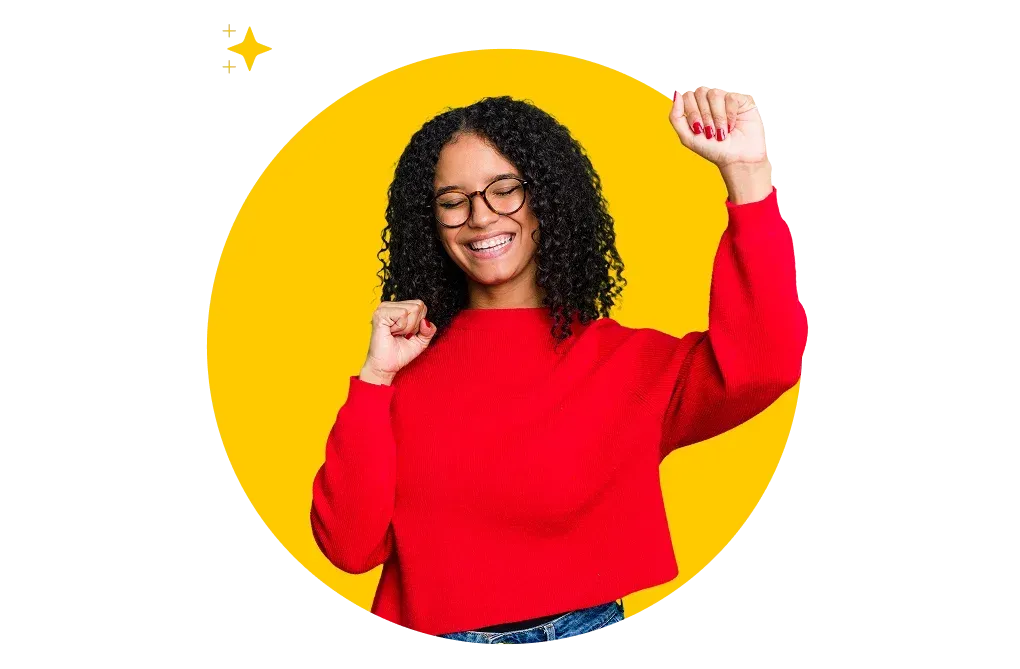 Smiling woman in a red sweater celebrating, representing a successful intranet launch.