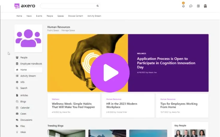 Workplace platform homepage with navigation, HR and wellness articles, and a play button.
